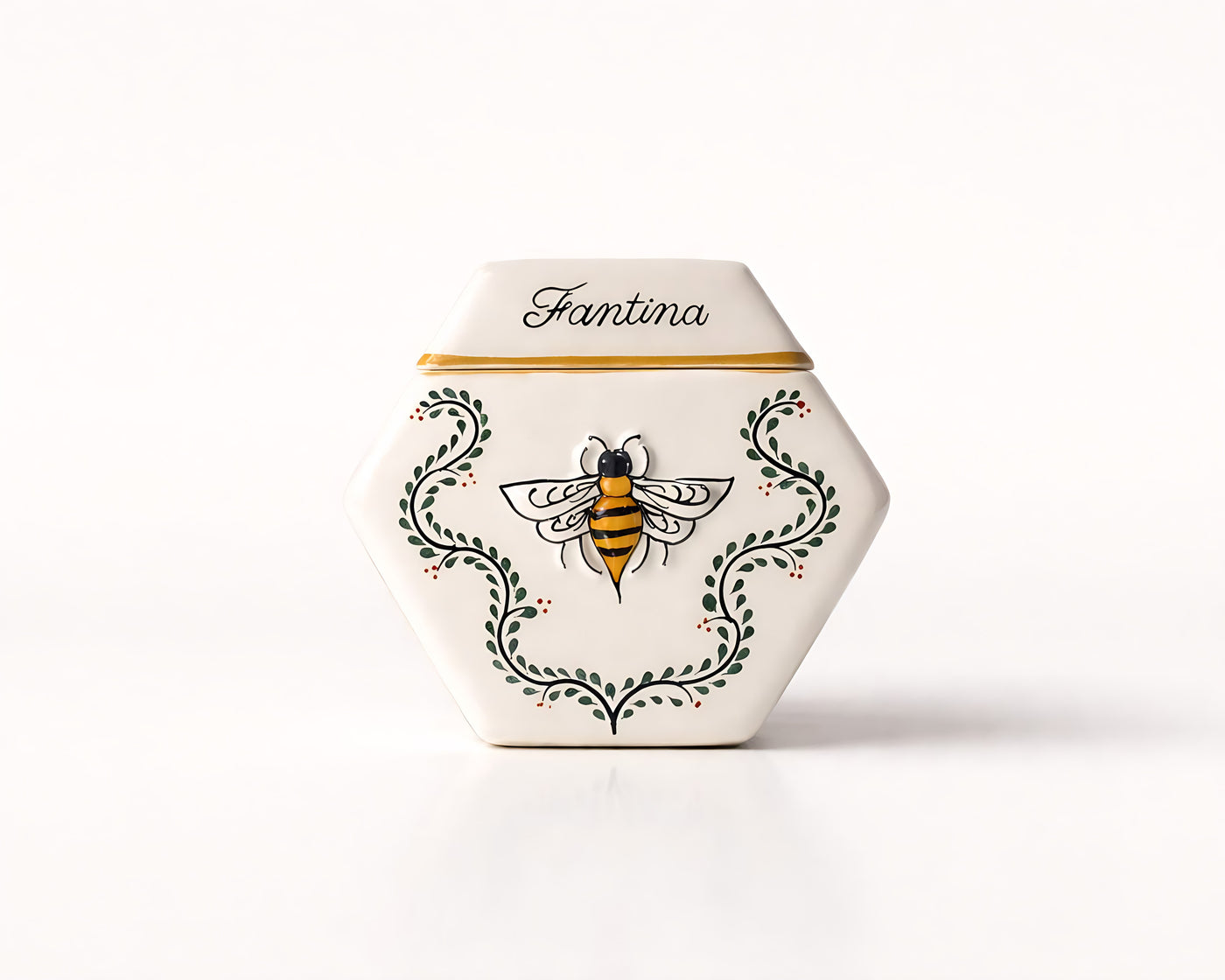 The Enredadera vessel, hexagonal ceramic painted freehand.
